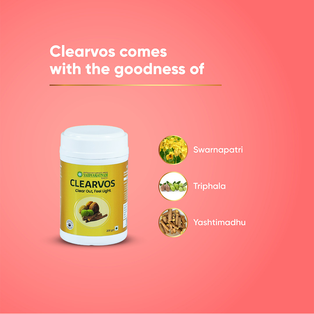 Pharmacist handing a box of over-the-counter laxative medicine to a customer at a pharmacy counter.